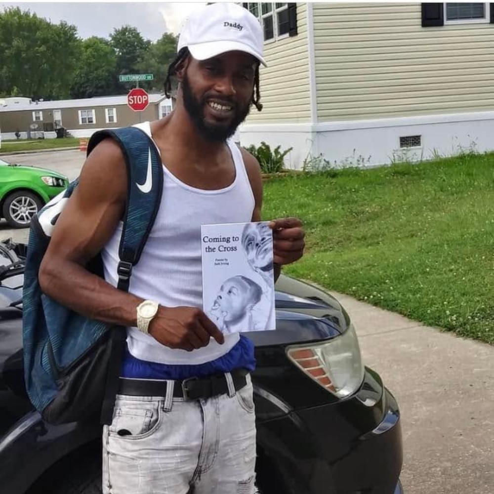 Reader holding Seth Irving's book