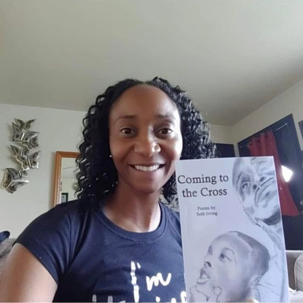 Reader holding Seth Irving's book